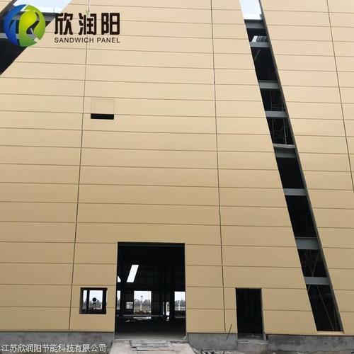 新型節(jié)能保溫金屬幕墻板的創(chuàng)新與應(yīng)用——浙江聚氨酯封邊巖棉復(fù)合一體板解析